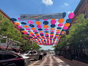 Umbrellas up on 3rd Street